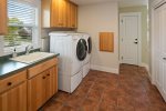 Additional laundry room upstairs is great for families.